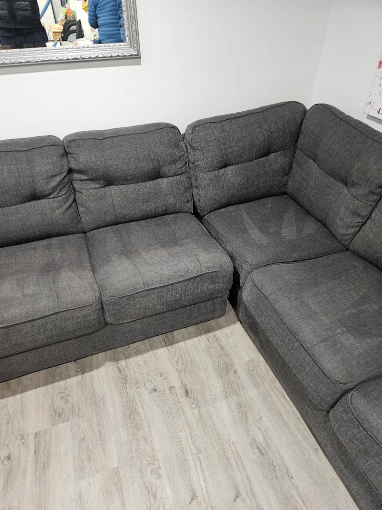 Gray sectional after cleaning by Long Island Carpet Cleaning