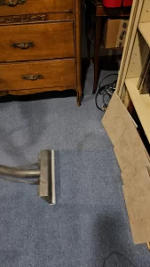 Hand tool on carpet edges on Long Island
